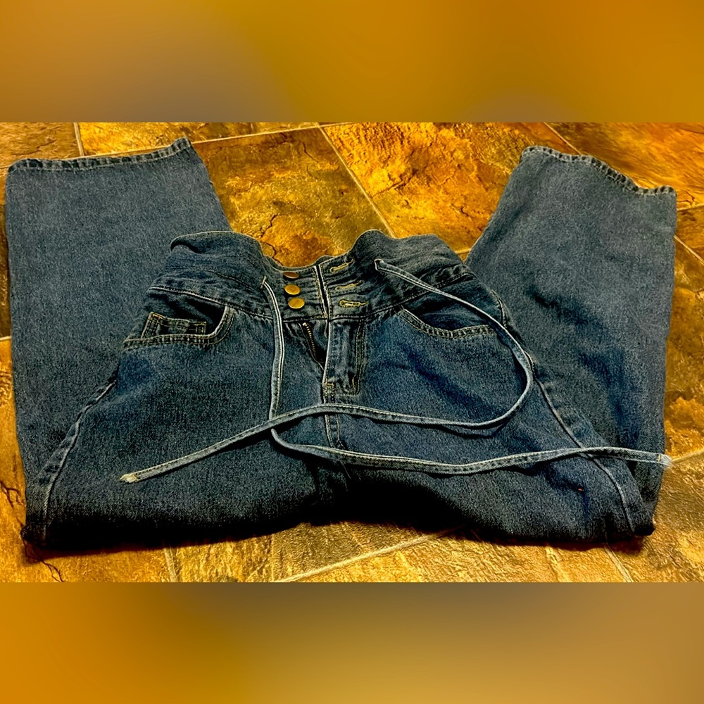 two pairs of small, high waisted boot, cut jeans.